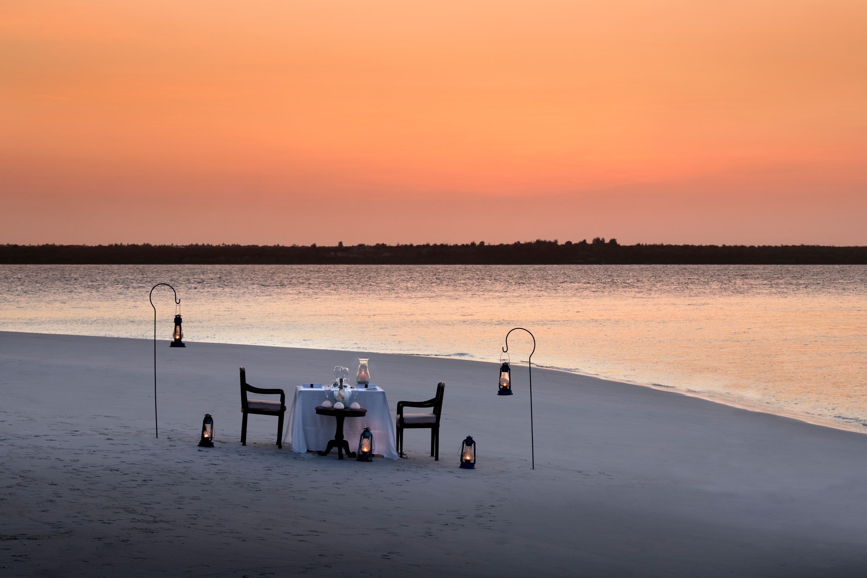 Mnemba Island, Zanzibar — a lantern-lit dinner on a private shore