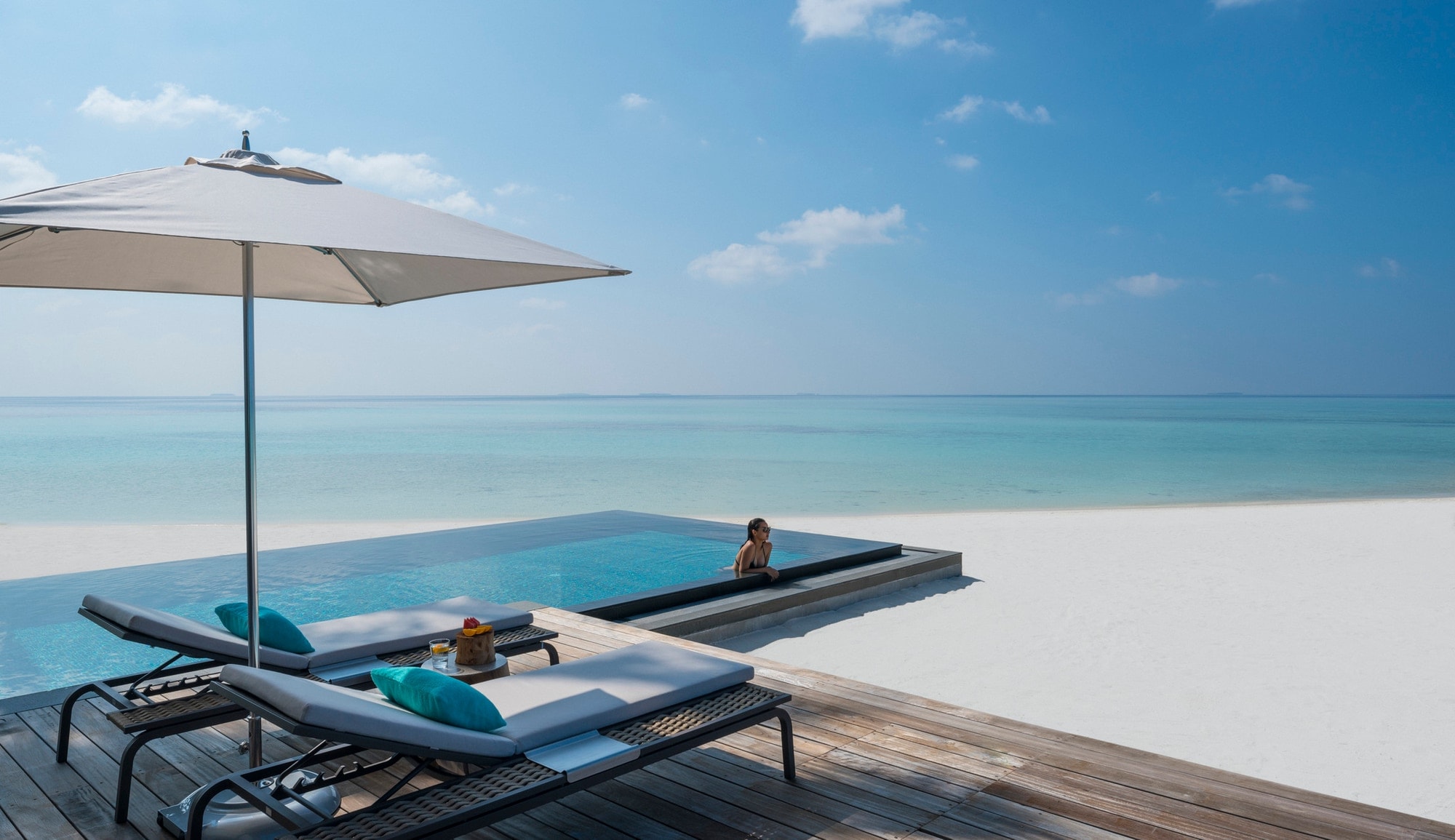 Voavah, Baa Atoll, Maldives — the private pool of a three-bedroom beach villa overlooking the lagoon