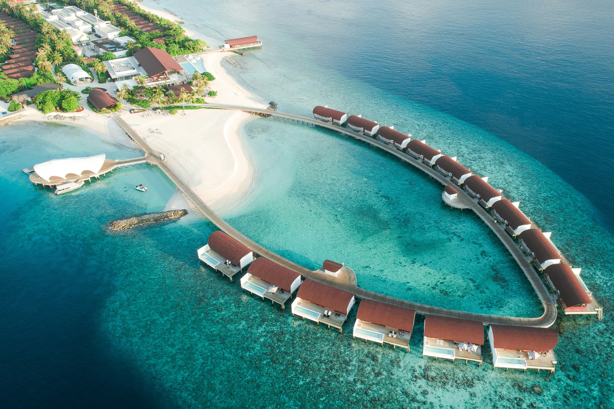 Baa Atoll, Maldives — a wellness-led crescent of overwater villas in the Baa Atoll