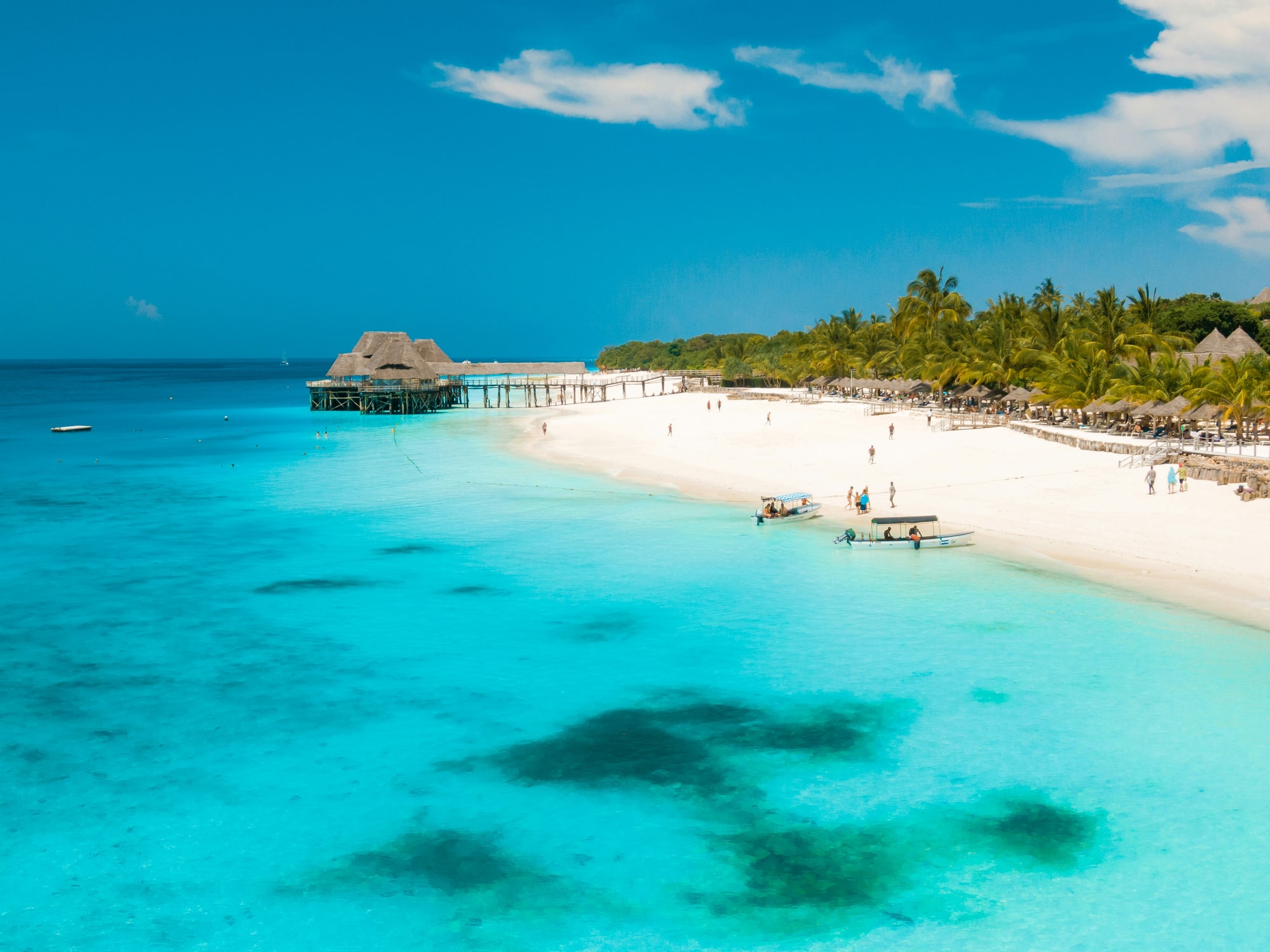 Nungwi Beach, Zanzibar — traditional dhows on the turquoise waters off Nungwi