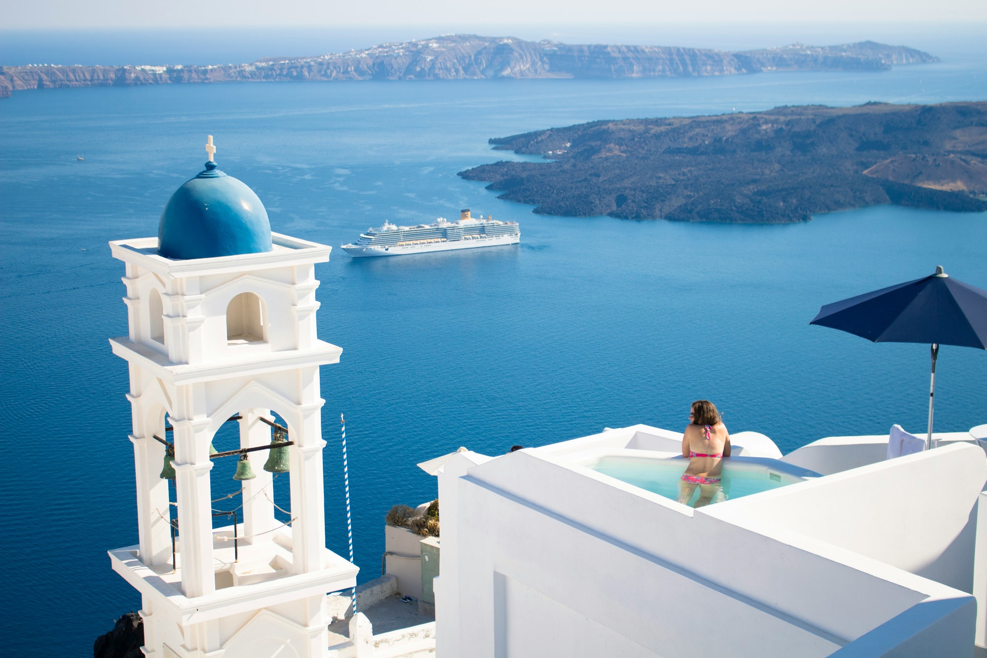 Imerovigli, Santorini — relaxing in a hot tub overlooking the caldera in western Santorini