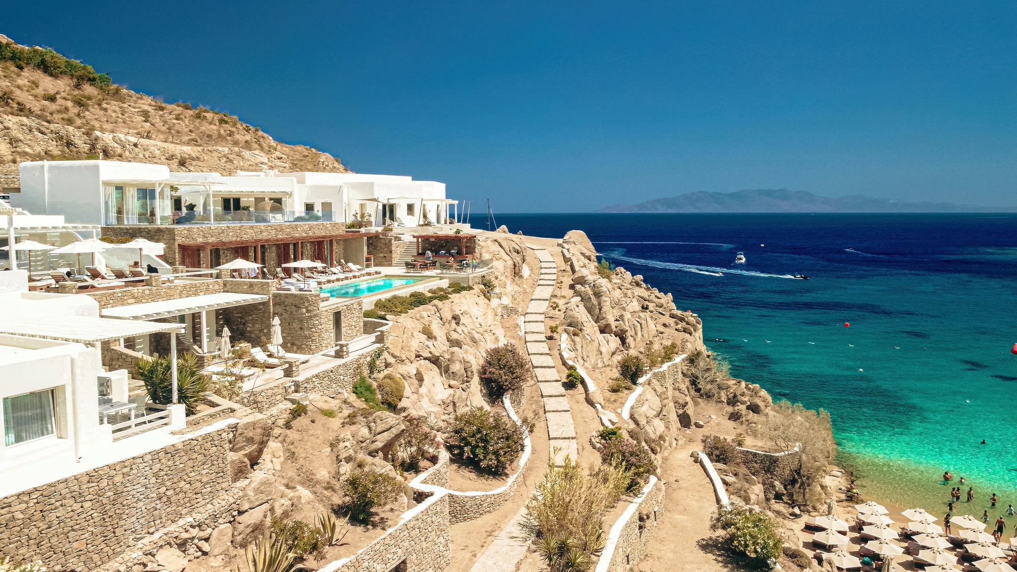 Mykonos, Cyclades — a clifftop terrace above Super Paradise beach
