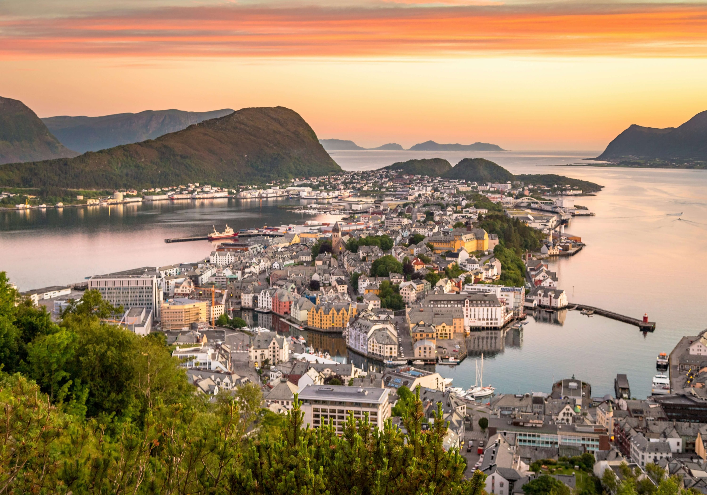 Ålesund, Møre og Romsdal, Norway — watching sunset over the harbour town of Ålesund