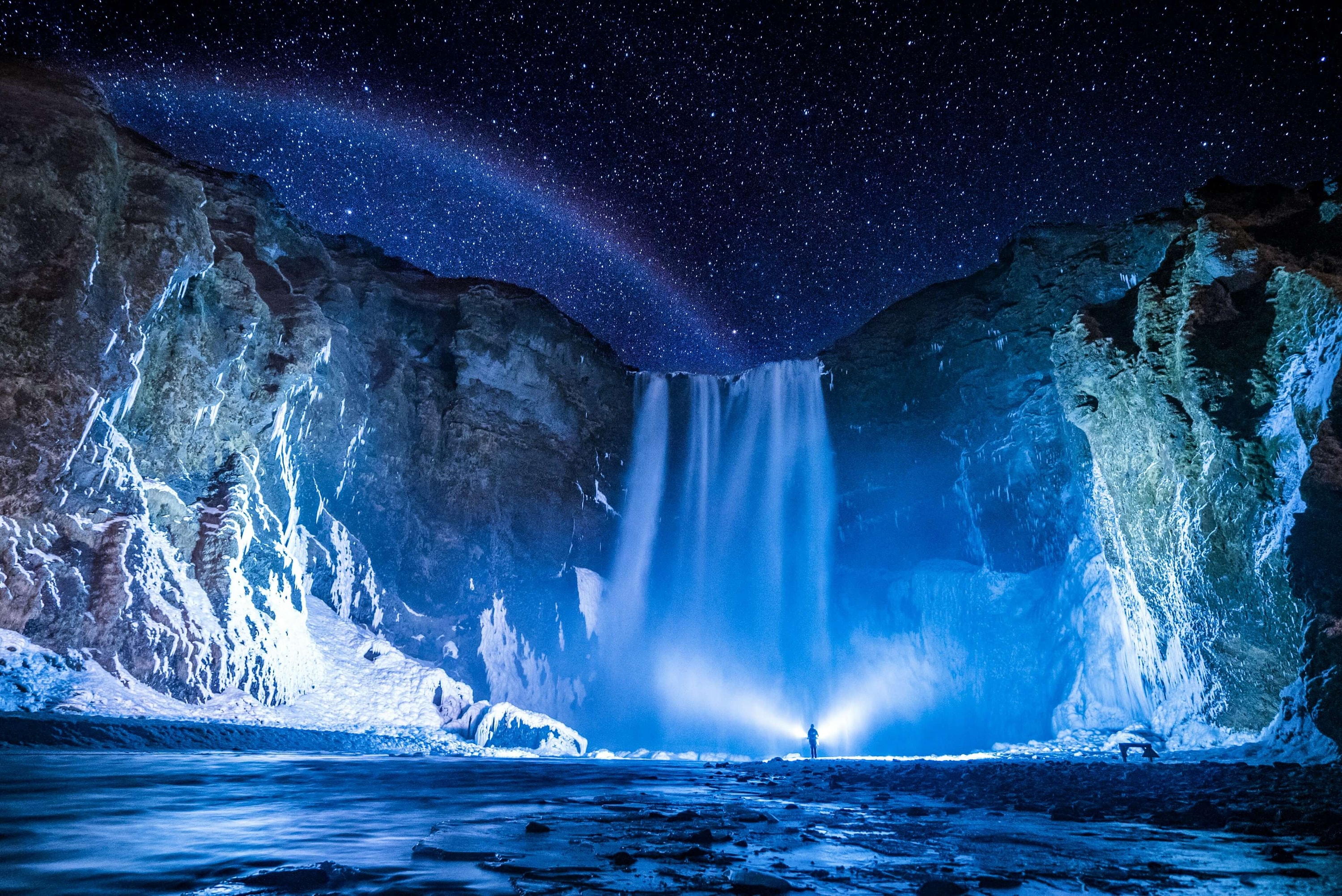 Skógafoss, South Iceland — Skógafoss waterfall under a starlit Arctic sky