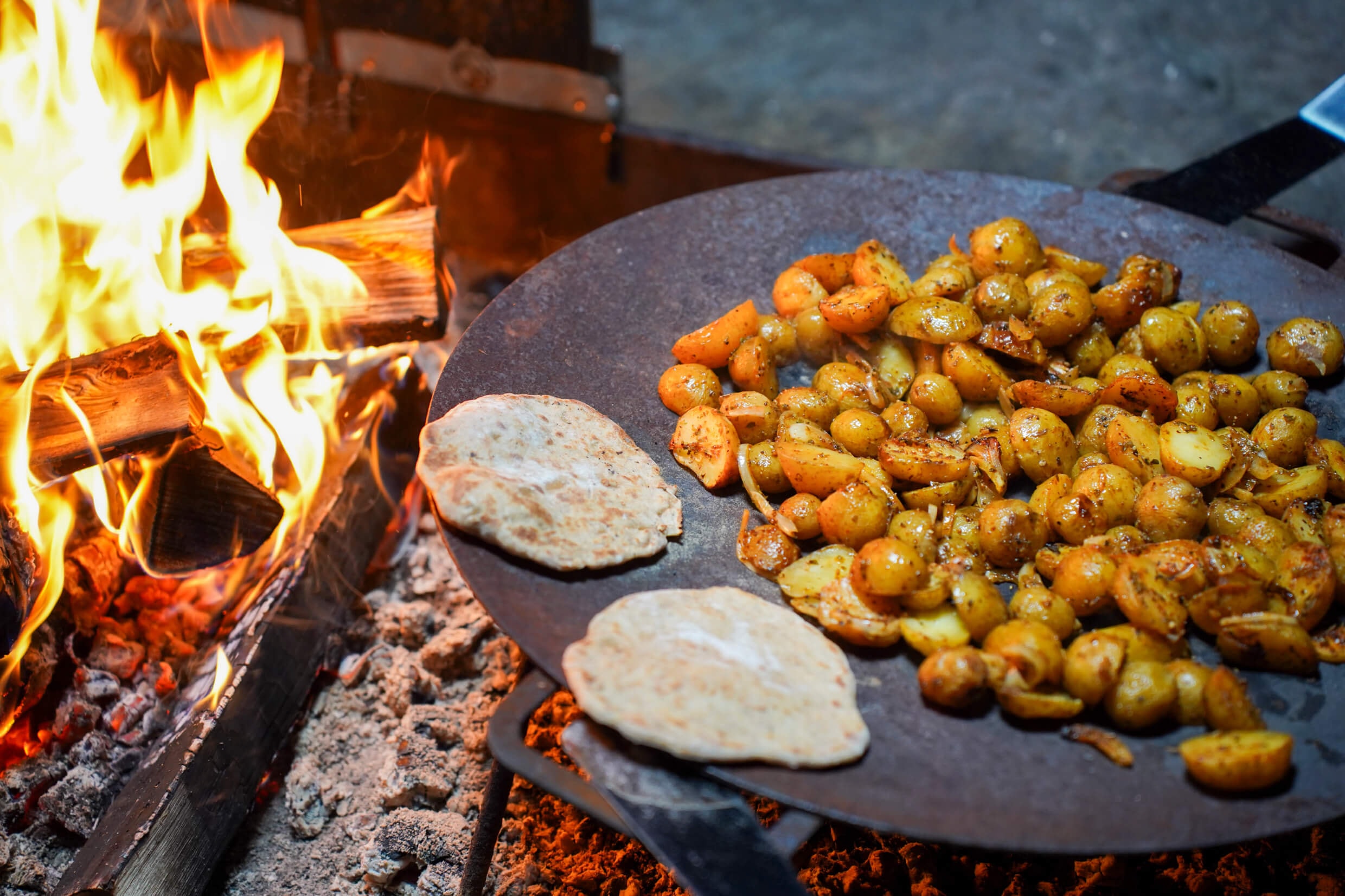 Kukkolaforsen, Haparanda, Norrbotten, Sweden — cooking over an open fire at Kukkolaforsen